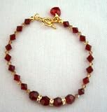 Genuine Swarovski Red Siam Crystal In 22k Gold Plated Bracelet w/ Heart Dangling Toggle Clasp (BRAND NEW)