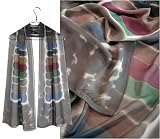 ULRIKE Oblong Flat Crepe Silk Scarf - A beautiful painterly stone gray field borders a chain of muted multicolored lozenge shapes.