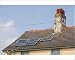 Photographic Print of Solar water heaters on a house roof in Barrow in Furness, Cumbria, UK. from Specialist Stock