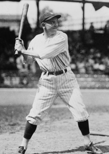 1924 photo Joe Harris, of the Washington Nationals baseball club, holding up bat at plate