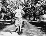 TOM HANKS AS FORREST GUMP FROM FORRES...