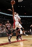 Chicago Bulls v Toronto Raptors: Leandro Barbosa and Taj Gibson Photographic Poster Print by Ron Turenne, 24x36