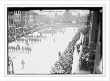 Newswire Photo (L): 10th Calvary marching in parade on Wall St., New York