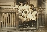 1912 child labor photo Typical group of Home Workers crocheting on steps, 16 South Street, Somervill