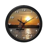 51RyqpwP7gL. SL160  Sunset Sailboat Cruise Hobbies Wall Clock by CafePress