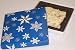Scott's Cakes 1 lb. White Chocolate Cashew Bark in a Snowflake Box