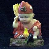 Buddah Boy Conversing with Rooster