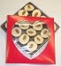 Scott's Cakes 1 lb. White Chocolate Almond Clusters in a Heart Box