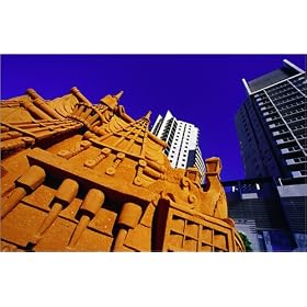 photographie Sand sculpture at Sand Sculpting Australia event, with high-rise apartment buildings...