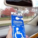 MirorTag Gold - A Novel Way to Protect, Display & Put Away a Handicapped Parking Placard. Sturdy handicap placard cover and protector; unlike the 8 mils cheap and flimsy ones, this holder is 60 mils thick and will never melt or bend or break in the sun or cold. Magnetically snaps On & Off to a Hook you mount behind your rearview mirror. No more back & neck pain. No more hanging & removing, and no screw adjusting or flipping visor or rotating placard ever needed. Full protection, and ON and OFF in a snap. Made in USA