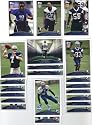 2009 Topps Dallas Cowboys Complete Team Set of 21 cards including Tony Romo, Felix Jones, DeMarcus Ware, Roy Williams, and more!