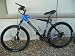 Trek 4500 Mountain Bike: Aluminum frame, Bontrager Rims, Shimano Exchange, Front and Rear Disc Brakes, Front RockShox Shocks, Blue and Black, Mirror