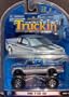 1 Badd Ride Truckin Blue & Silver Ford F-150 4X4 1:64 Scale Die Cast Truck Car