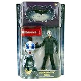 Eigenschaften MATTEL Batman / DC - Batman - The Dark Knight - Movie Action Figur - GOTHAM CITY THUG with Crime Scene Evidence / Happy Face Mask (mit braunen Haaren) - OVP
