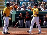 Baltimore Orioles v Pittsburgh Pirates, BRADENTON, FL - FEBRUARY 28: Lyle Overbay and Garrett Jones Photographic Poster Print by J. Meric, 9x12