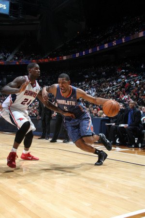 Charlotte Bobcats v Atlanta Hawks: Dominic McGuire and Marvin Williams Photographic Poster Print by Scott Cunningham, 8x12