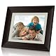 Coby 10.4-Inch Digital Photo Frame with MP3 Player DP1052 (Wooden Frame) $45.60