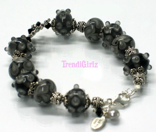 Click here to buy ONE OF A KIND LAMPWORK GLASS BEADS STERLING SILVER BRACELET (Midnights Dream).