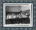 Historic Print (L): [Group of young women performing atmospheric pressure experiments while studying science