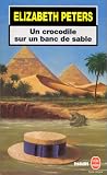 Un crocodile sur un banc de sable
