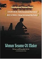 Woman Sesame Oil Maker