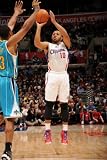 New Orleans Hornets v Los Angeles Clippers: Eric Gordon Photographic Poster Print by Andrew Bernstein, 24x36