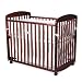 Alpha Mini Rocking Crib in Cherry Finish By Da Vinci Baby Furniture