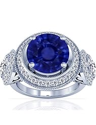 Platinum Round Cut Blue Sapphire Ring With Sidestones
