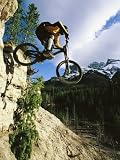 Man Jumping on His Mountain Bike with Ha Ling Peak in the Background Photographic Poster Print by Mark Cosslett, 12x16