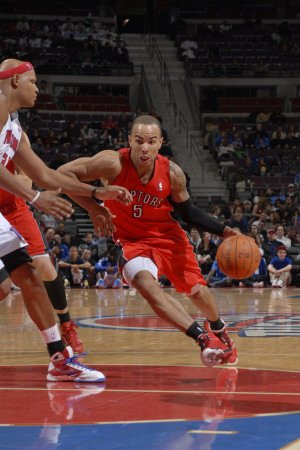 Toronto Raptors v Detroit Pistons: Jerryd Bayless and Charlie Villanueva Photographic Poster Print by Allen Einstein, 28x42