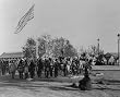 1898 photo Cheyenne and Arapahoe people in circle around flagpole, at the Indian Congress of the Tra