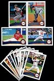 2011 Topps Atlanta Braves Complete Series 1 & 2 Team Set / 24 Cards including Prado, Hudson, Chipper, Freddie Freeman RC, Uggla, Heyward, McCann, Brandon Beachy RC & more!