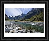 Framed Print of Mountain scenery - Hollyford river flowing down Hollyford valley surroundend by from Ardea