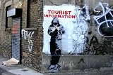 LAMINATED Banksy Tourist Information Hoody Mini Poster Measures 24 x 17 (61 x 43 cm)