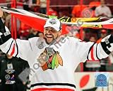 Dustin Byfuglien with Chicago Blackhawks Flag 2010 Stanley Cup Finals , 10x8
