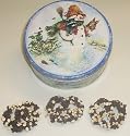 Scott's Cakes 1 lb. Dark Chocolate Covered Pretzel with Chocolate Chips & White Chocolate Chips in a Classic Snowman Tin