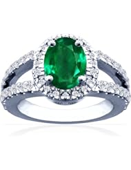Platinum Oval Cut Emerald Ring With Sidestones
