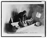 Historic Print (M): Hopi corn grinder / Kolb Bros. photo.