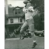 Vintage Photo- Football player throwing pass