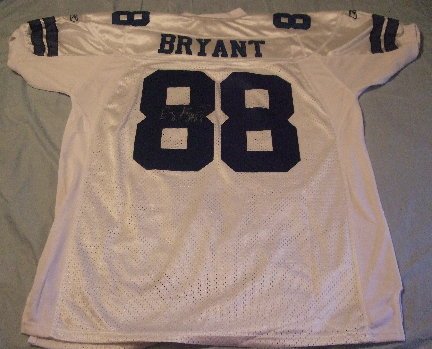 Dez Bryant Autographed White Dallas Cowboys Jersey W/PROOF, Oklahoma State Cowboys, Picture of Dez Signing the Jersey