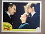 DV49 Woman's Face JOAN CRAWFORD '41 Portrait Lobby Card.  Here's a terrific PORTRAIT lobby card from the original release of A WOMANS FACE featuring a great image of JOAN CRAWFORD, CONRAD VEIDT and MELVYN DOUGLAS.    Lobby card is in VERY GOOD+ condition. A few pinholes, no stains, a 1/2" edge tear on the right border and a few knicks on the left border, all repaired with acid free tape on the back .