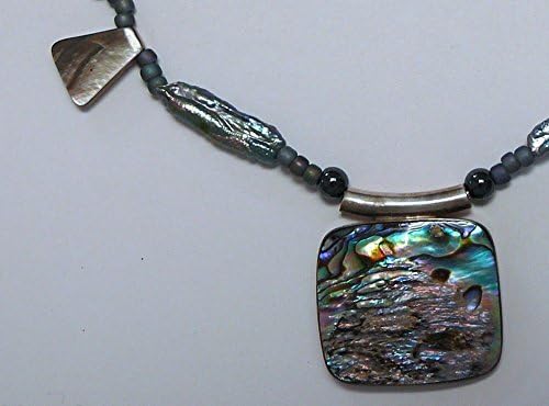 N2 - Abalone and black-lip shell necklace