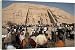 Tourists gather at the Great Temple of Abu Simbel - 20 Inch Canvas Print (51cm) by Robert Harding