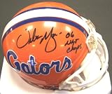 Urban Meyer Autographed Florida Gators Mini Helmet with "06 NATL CHAMPS" inscription
