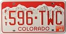 Colorado License Plate with Red Letters with White Mountain