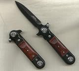  : Haller Einhand Messer mit besonderer Klingenform und federunterstuetzter Klingenoeffnung