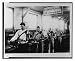 Historic Print (L): [Four Belgian(?) soldiers, each wearing a prothesis on his arm, working in a machine sho