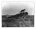 Historic Print (L): C. Eugene Johnson lands his plane at Curtiss Field with the first...