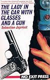 The lady in the car with glasses and a gun