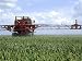 Agriculture, Machine Crop Spraying with Pesticides in East Anglia Photographic Poster...